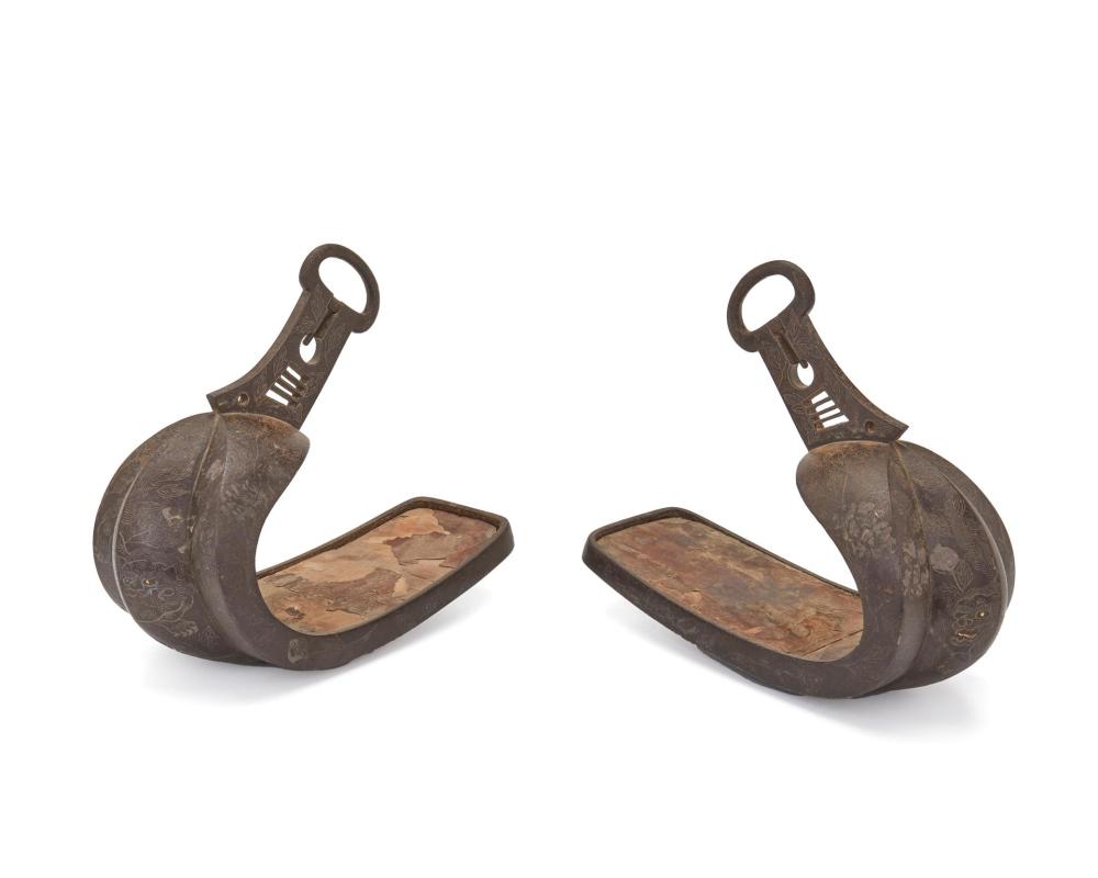 Appraisal: A pair of Japanese iron Abumi stirrups Meiji Period -