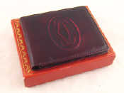 Appraisal: A gentleman's Cartier maroon leather card and currency wallet in