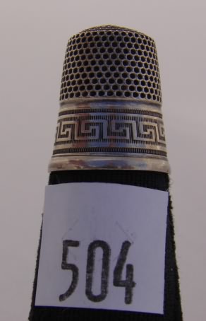 Appraisal: Sterling thimble with geometric design on band