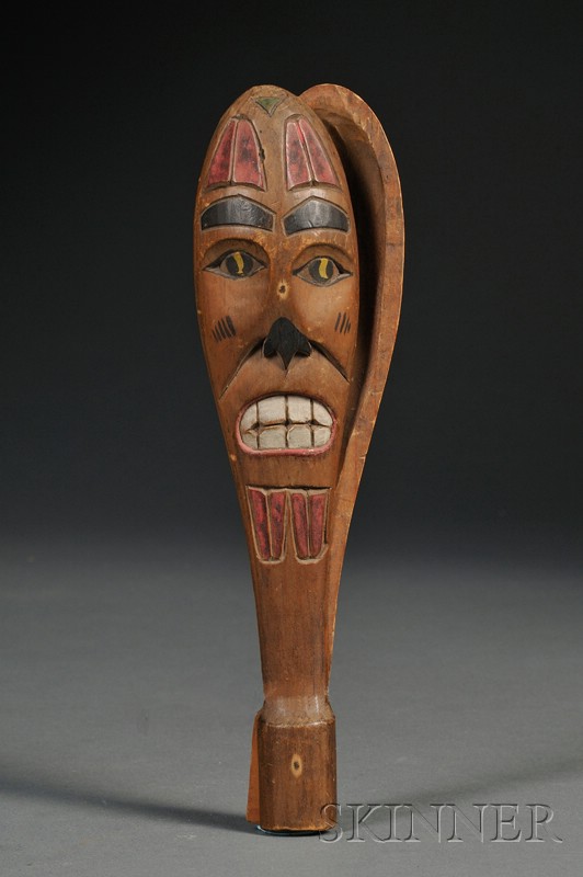 Appraisal: Northwest Coast Carved Wood Clapper c late th century both