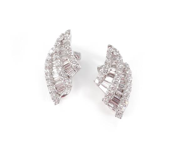 Appraisal: Pair diamond earclips K white gold setting accented with round