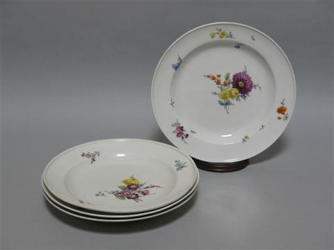 Appraisal: FOUR MEISSEN DINNER PLATES Blue crossed swords and dot marks