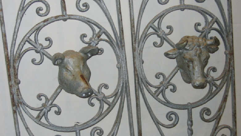 Appraisal: PAIR OF WROUGHT IRON FIGURAL ARCHITECTURAL PANELS Rectangular with allover