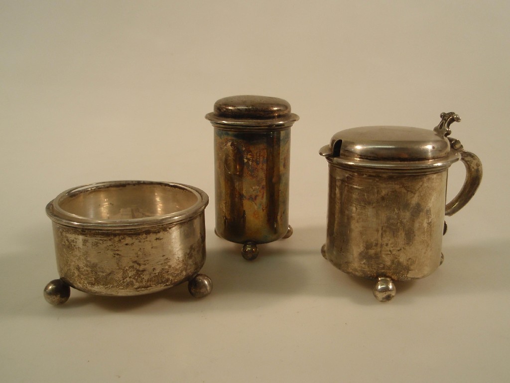 Appraisal: A George V silver cruet set comprising mustard salt and