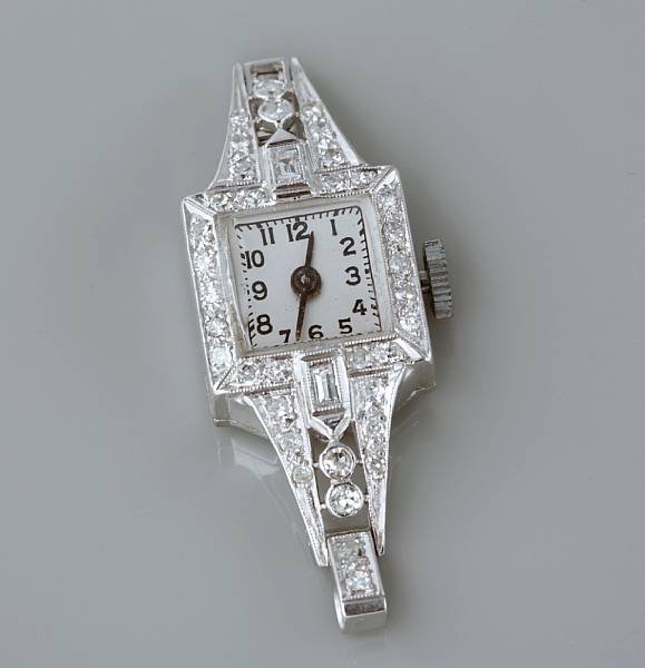 Appraisal: A diamond and platinum watch no strap or clasp