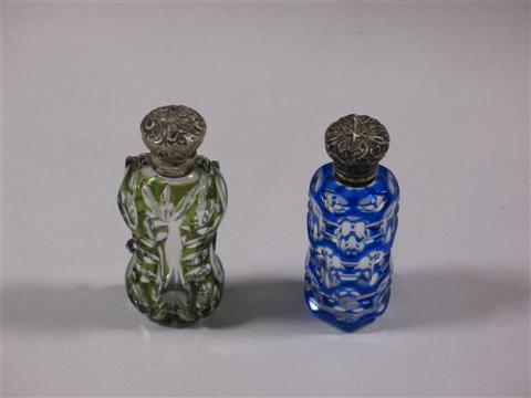 Appraisal: TWO SILVER TOPPED GLASS PERFUME FLASKS Late th century the