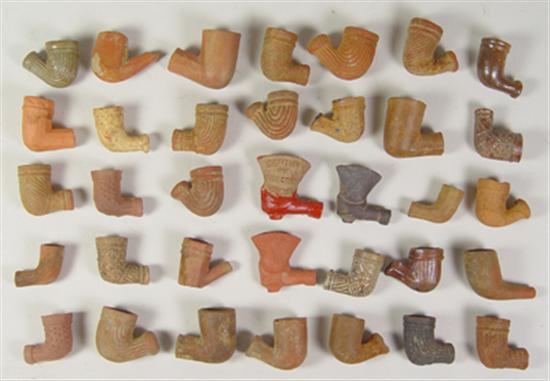 Appraisal: Clay Tobacco Pipes Circa - clay pipes glazed and unglazed