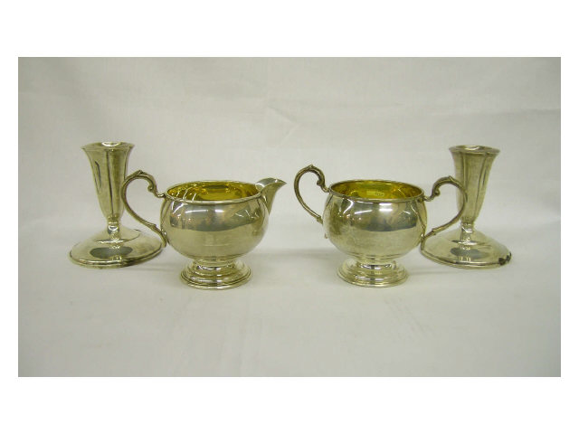 Appraisal: Pair of sterling silver cream and sugar with gold wash