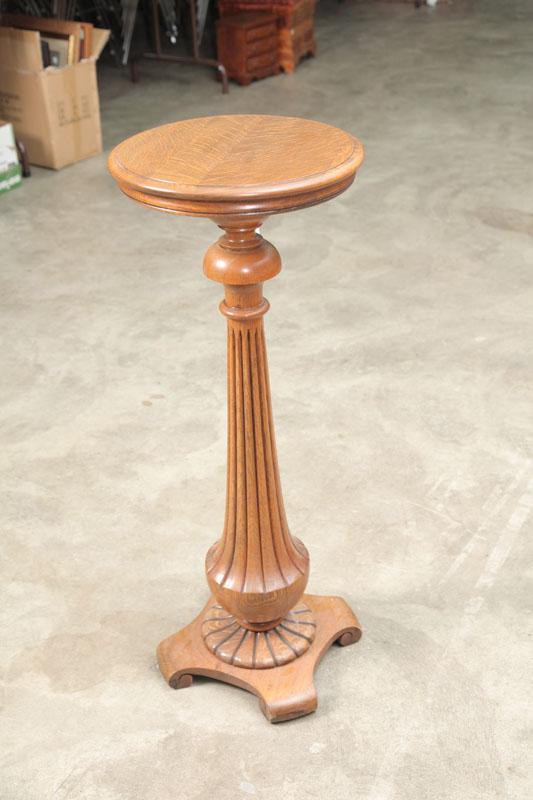 Appraisal: FERN STAND Oak with a round top fluted and turned