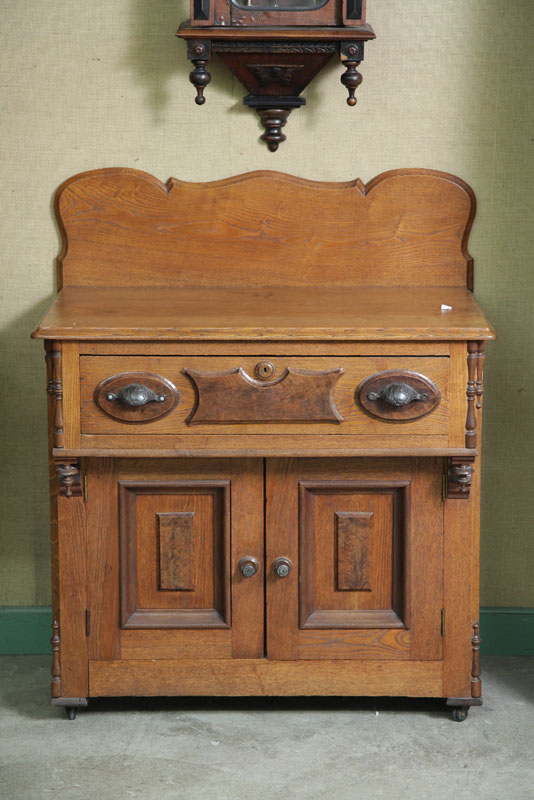 Appraisal: VICTORIAN WASH STAND Oak with applied burlwood Shaped gallery one