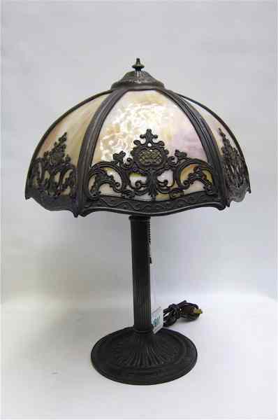 Appraisal: AN AMERICAN STAINED AND LEADED GLASS TABLE LAMP the metal