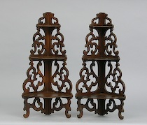 Appraisal: Pair of Victorian Corner Shelves Pierced walnut wall units for