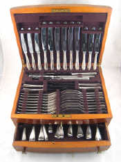 Appraisal: A fitted canteen of silver rattail pattern flatware for eight