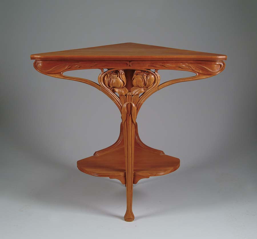 Appraisal: ART NOUVEAU CORNER TABLE Contemporary corner table is done in