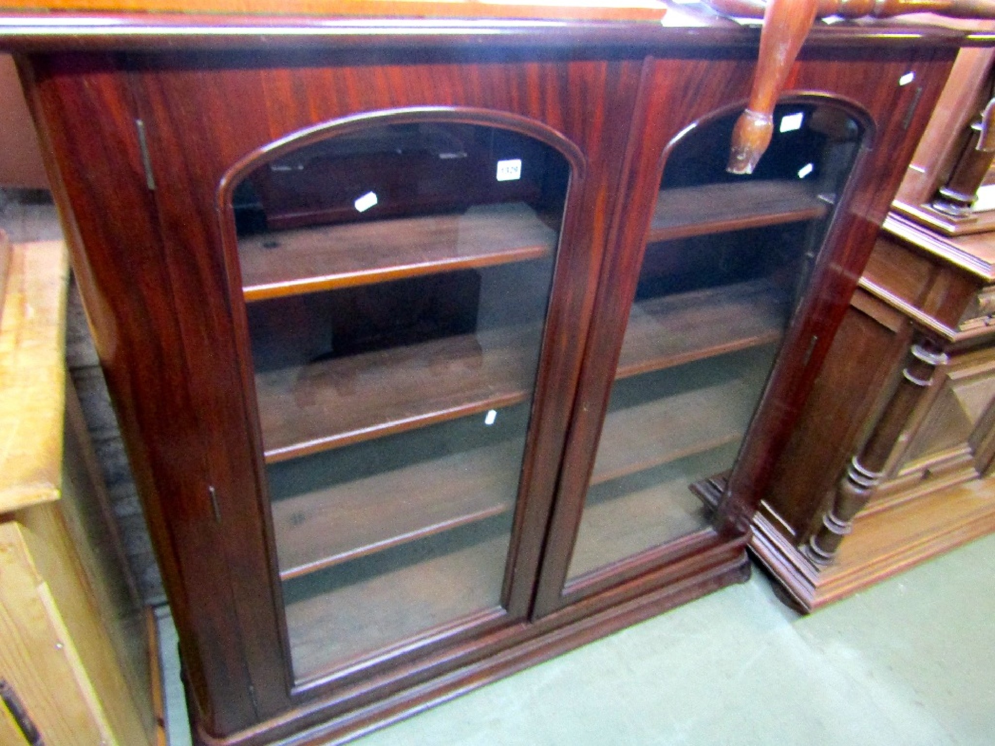 Appraisal: A good quality Victorian mahogany bookcase freestanding and enclosed by