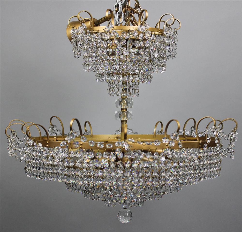 Appraisal: ROUND CUT CRYSTAL CHANDELIER the chandelier with an upper decorative