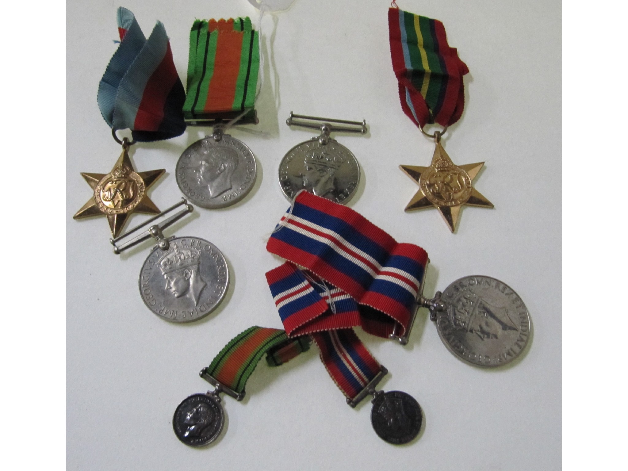 Appraisal: A lot comprising two groups of WWII medals and stars