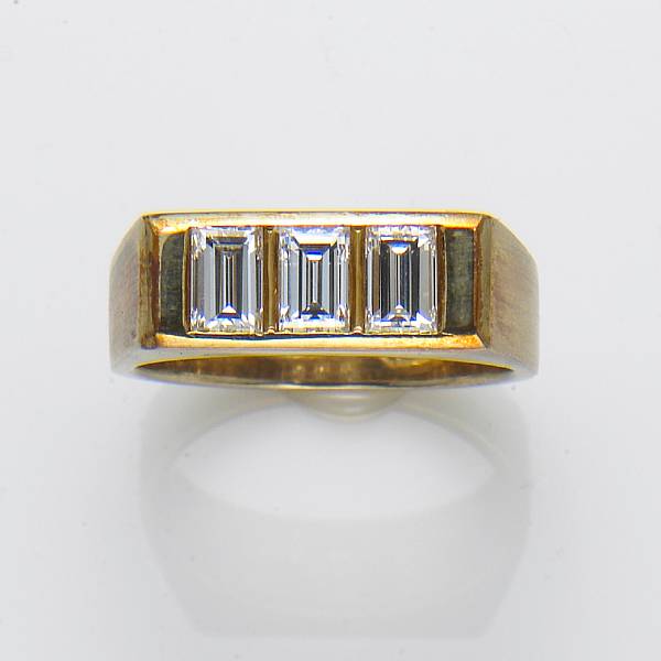 Appraisal: An emerald-cut diamond and k gold ring estimated total diamond