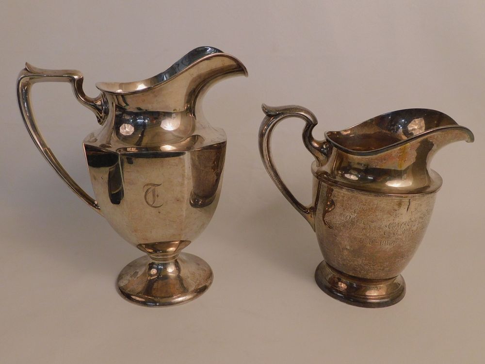 Appraisal: STERLING SILVER WATER PITCHERS Lot of large sterling silver pitchers