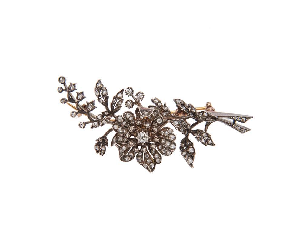 Appraisal: Gold Silver and Diamond Brooch the en tremblant floral motif