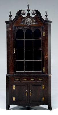 Appraisal: Colonial Revival corner cupboard mahogany with two-case construction Chippendale style