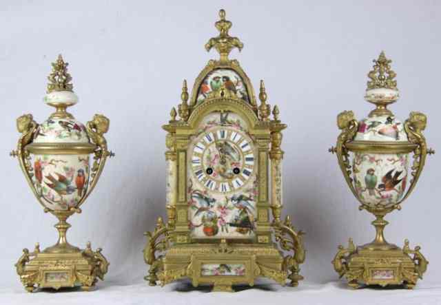 Appraisal: A French gilt metal mantel clock in a domed case