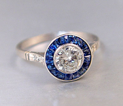 Appraisal: PLATINUM DIAMOND AND SAPPHIRE RING Platinum ring contains transitional round