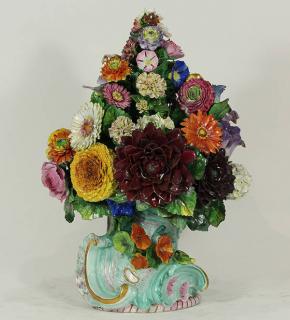 Appraisal: English polychrome decorated porcelain topiary of flowers English polychrome decorated