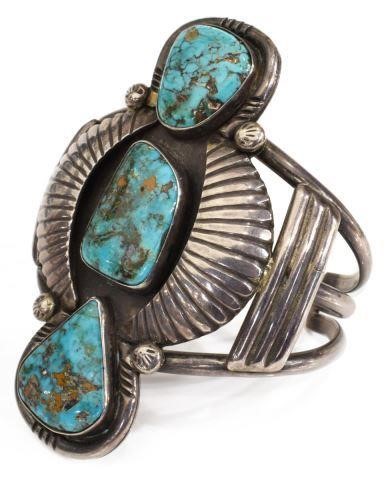 Appraisal: Large Native American silver content unknown and turquoise cuff bracelet