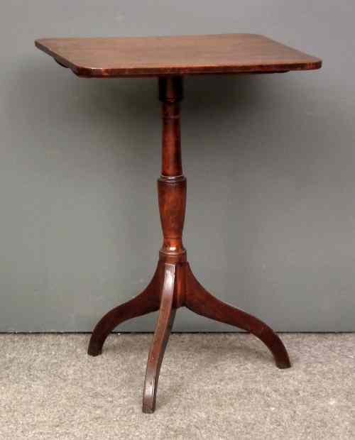 Appraisal: A late Georgian mahogany rectangular tripod table on turned column