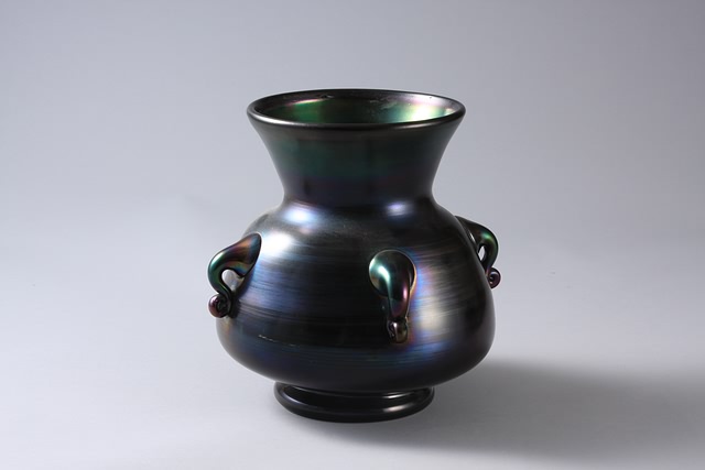 Appraisal: Gun metal vase with applied handles In the style of