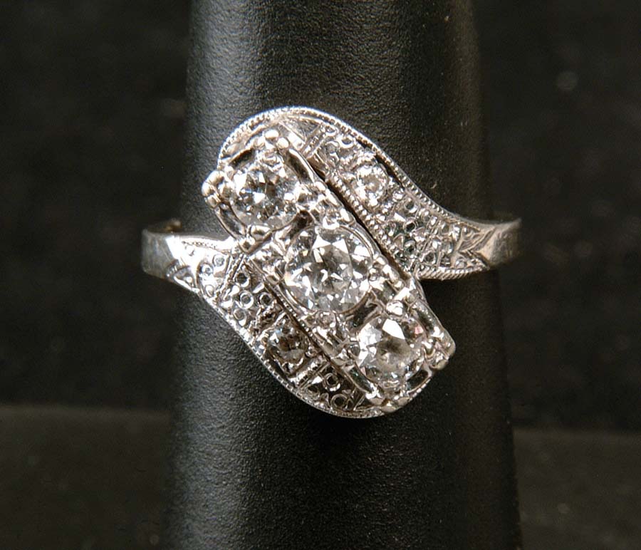 Appraisal: K DIAMOND RING Beautiful k white gold ring has three