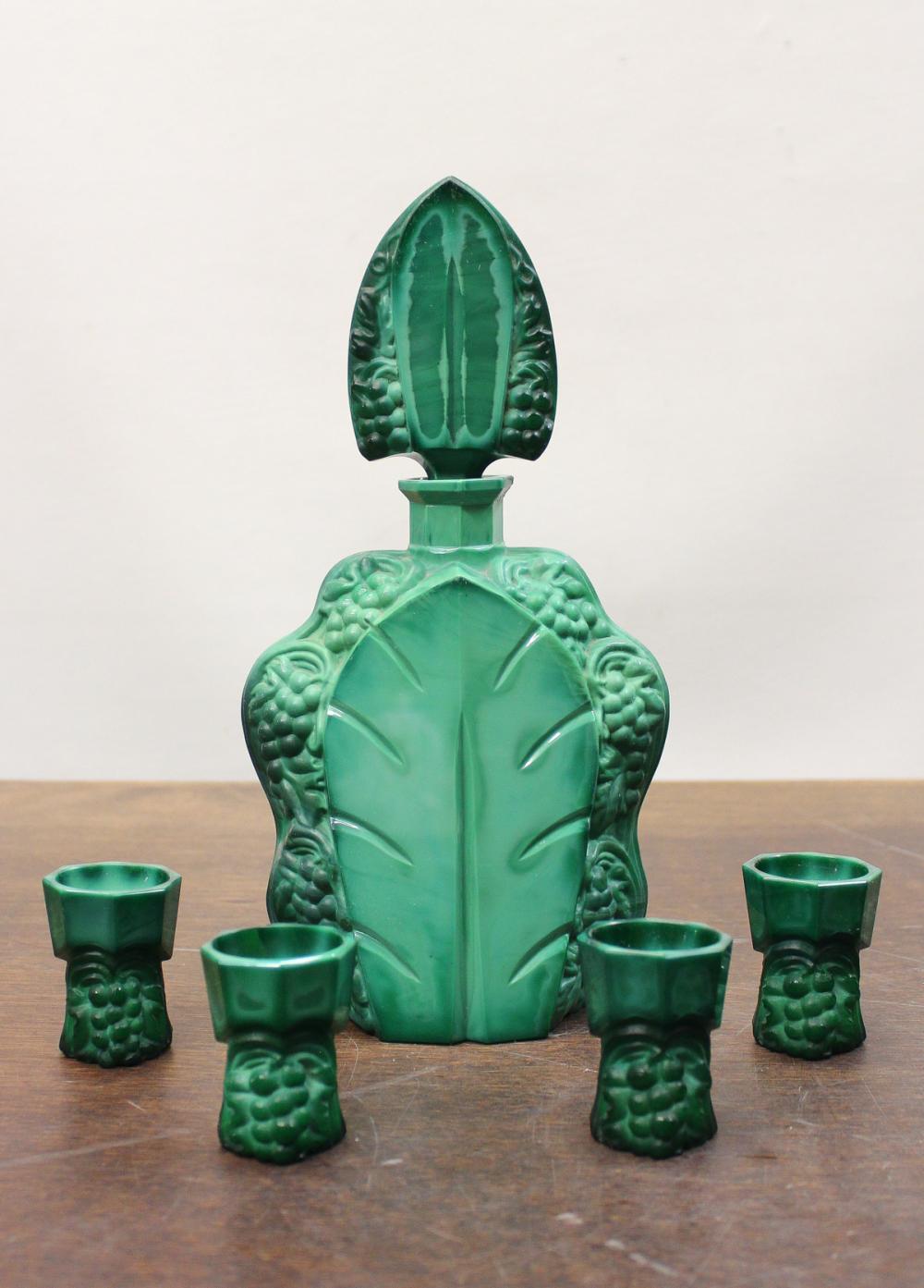 Appraisal: MALACHITE GLASS DECANTER AND CORDIAL SET piece set with grapevine