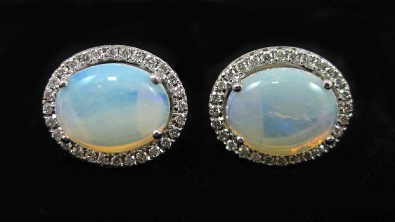 Appraisal: PAIR OF OPAL AND DIAMOND EARRINGS each k white gold