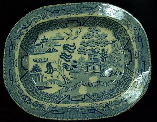 Appraisal: A th Century willow pattern meat plate transfer printed cm