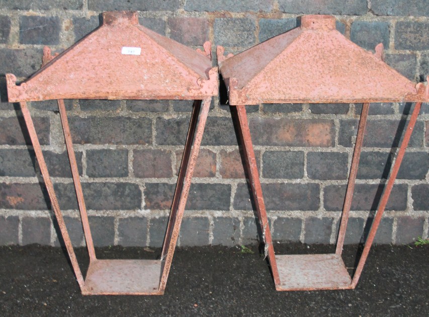 Appraisal: A pair of painted metal lanterns each with domed square