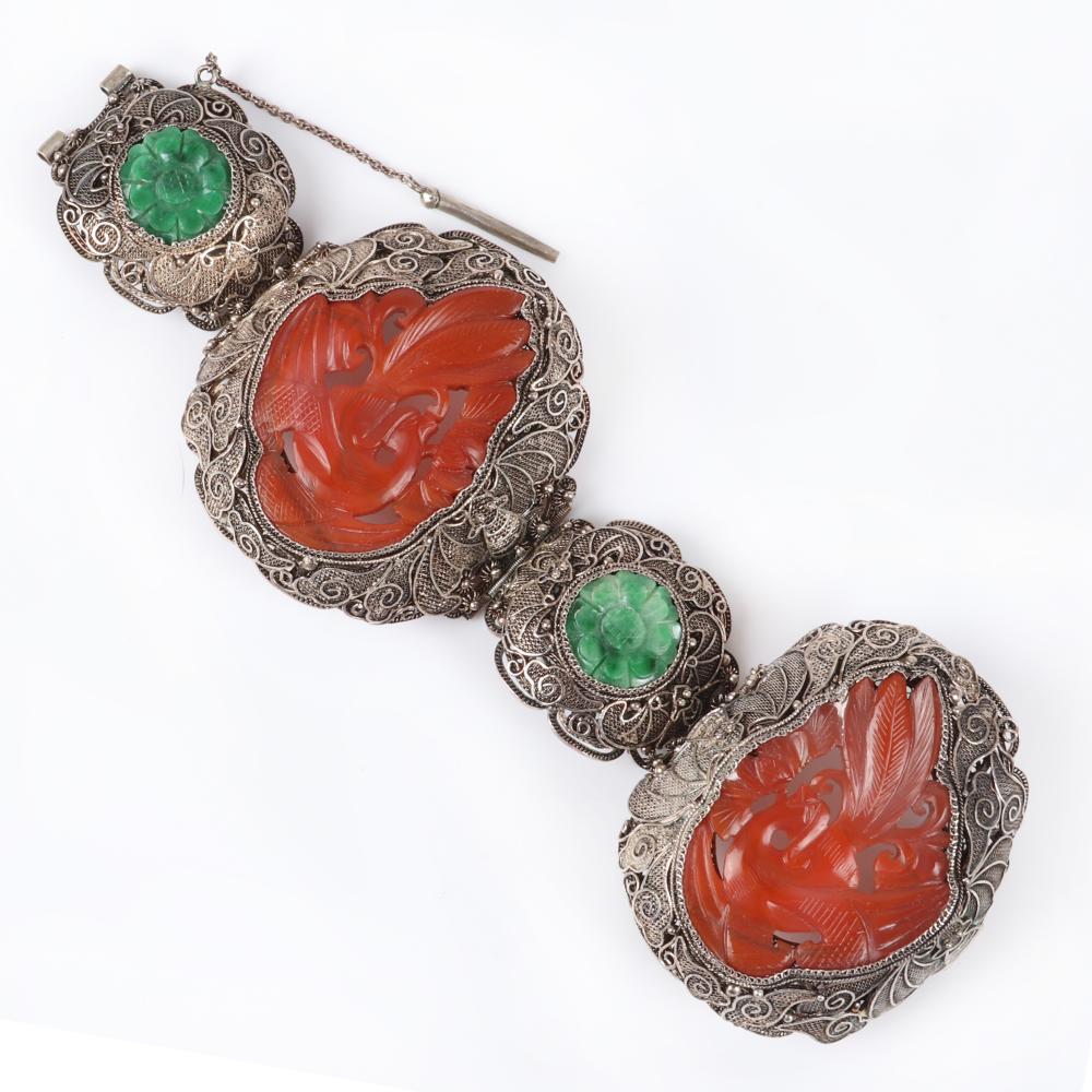 Appraisal: FINE ANTIQUE CHINESE CARVED CARNELIAN AND JADE BRACELET MOUNTED IN