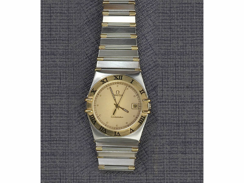 Appraisal: OMEGA CONSTELLATION Stainless steel mans quartz watch with yellow gold