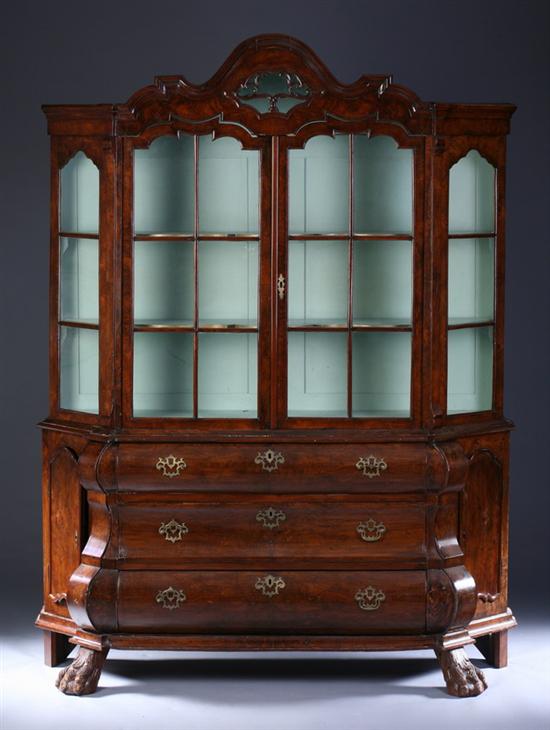 Appraisal: DUTCH BURLED WALNUT BOMBE CHINA CABINET early th century with