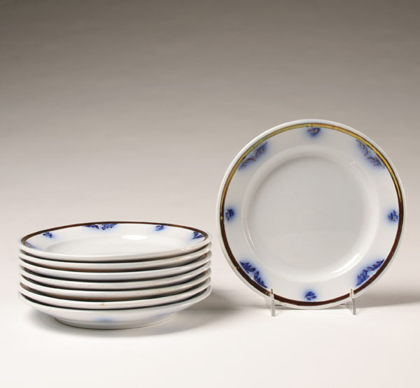 Appraisal: Eight ironstone plates with flow blue and copper lustre decoration