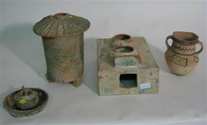 Appraisal: Chinese archaic-form pottery assortment Comprising green-glazed tripod granary square-form stove