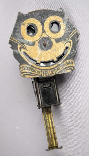 Appraisal: Tin Felix the Cat Sparkler Toy Description Marked Copyright Pat