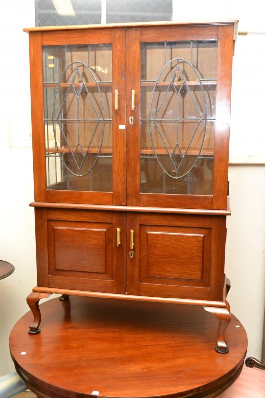 Appraisal: AN EDWARDIAN BLACKWOOD CRYSTAL CABINET WITH BAKELITE HANDLES KEY IN