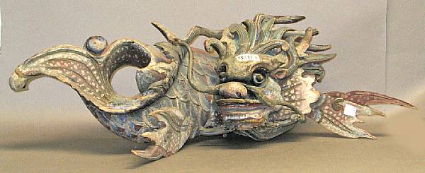 Appraisal: A pair of painted wood architectural fragments Depicting a dragon