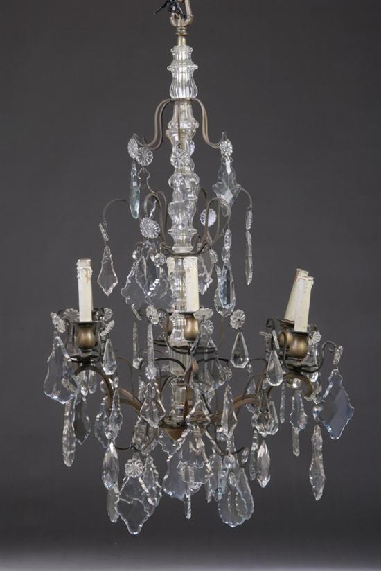 Appraisal: LOUIS XVI STYLE CRYSTAL AND GILT-METAL SIX-LIGHT CHANDELIER early th