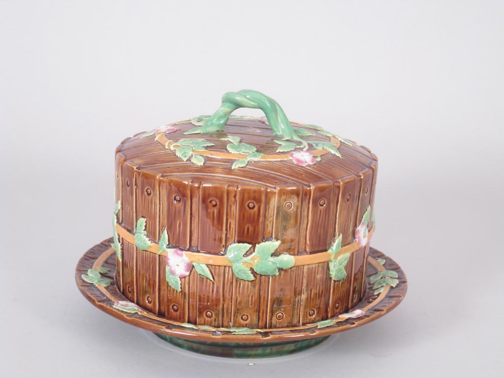 Appraisal: A George Jones Majolica Cheese Dish and Stand decorated flower