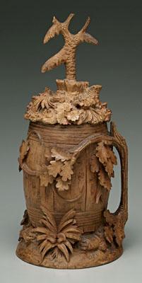 Appraisal: Carved wood lidded tankard carved as barrel with oak leaves