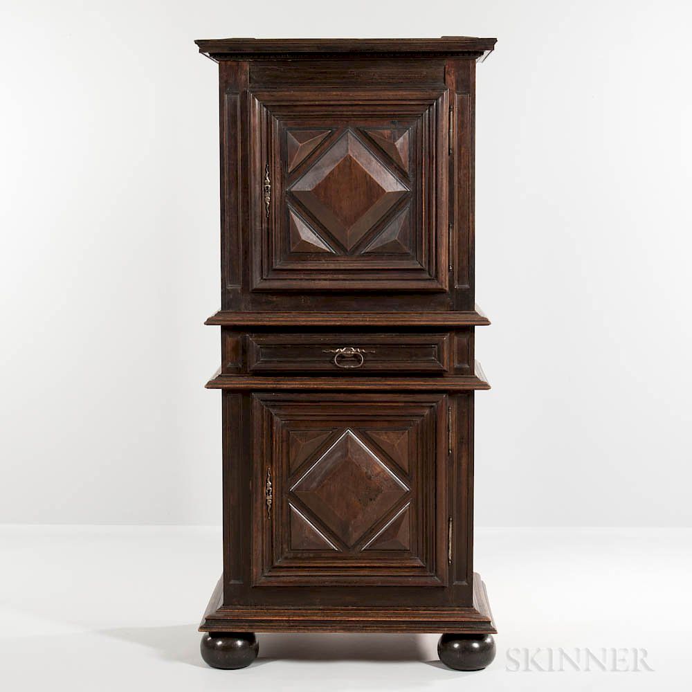 Appraisal: Continental Ebonized Walnut Cupboard Continental Ebonized Walnut Cupboard probably the