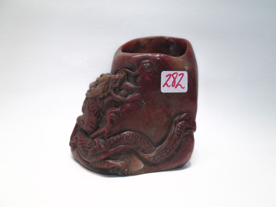 Appraisal: CHINESE CARVED SHOUSHAN STONE BRUSH POT with raised dragon motif