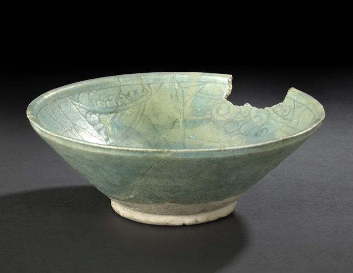 Appraisal: Attractive Ancient Persian Aquamarine-Glazed and Incised Rakka Pottery Bowl th-